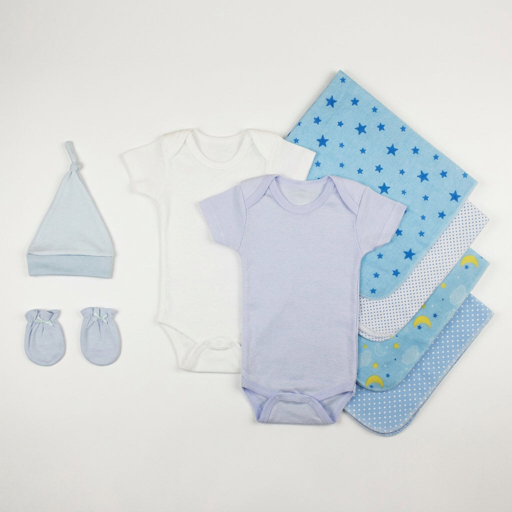 Essential Newborn Baby Boy layette set with blue and white cotton bodysuits, star-print blankets, hat and mittens.