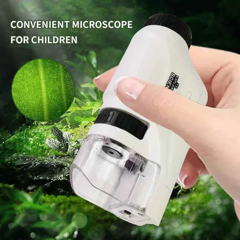 Kids Pocket Microscope Kit in white plastic with black adjustment knob, clear specimen chamber and compact handheld design.