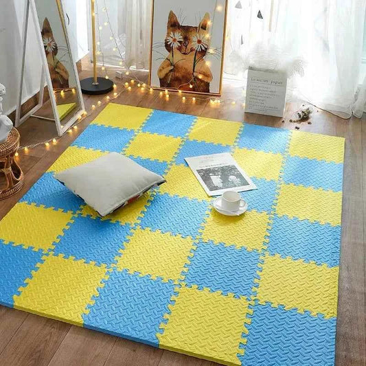 Puzzle Foam Play Mat made of blue and yellow EVA foam tiles, with interlocking edges and a textured surface.